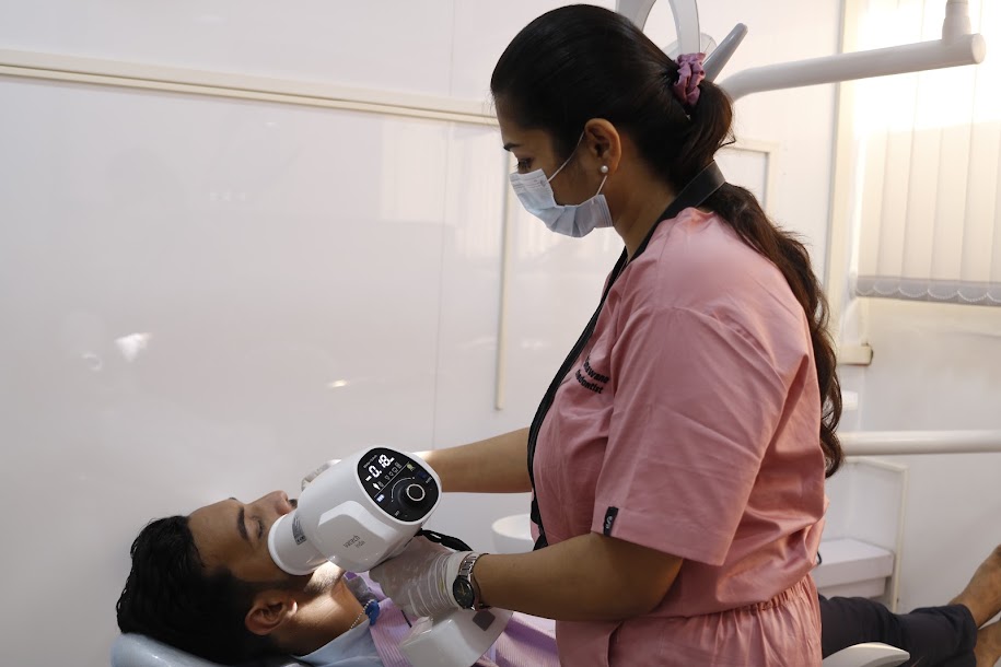 Dr. Monika Sonawane, a highly respected dentist at All Dent, Dental Clinic in Ulwe, Navi Mumbai treating Patient at her clinic.